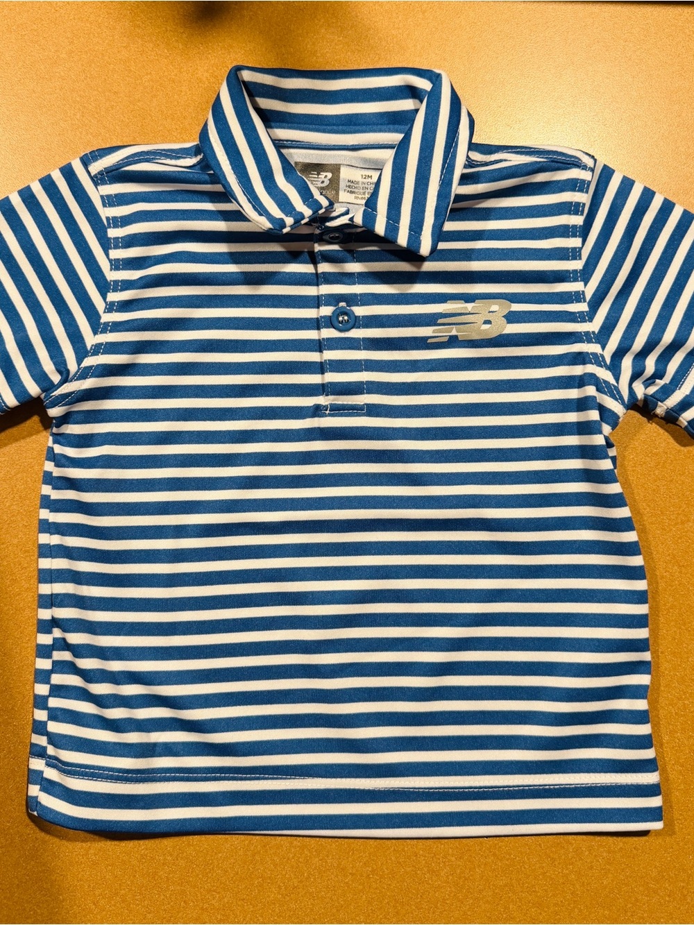 New Balance Striped Polo Shirt